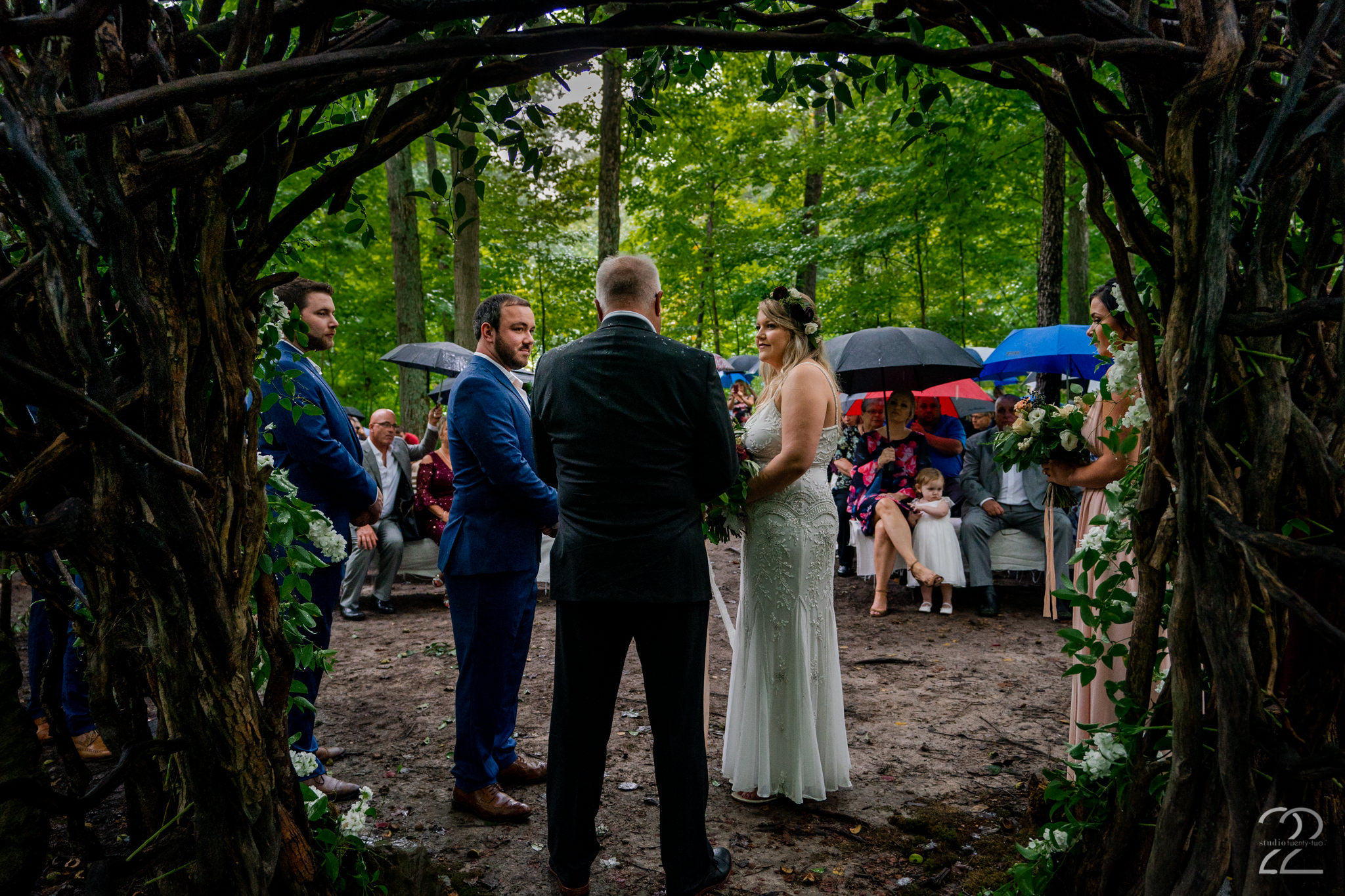  For better or worse, in sun and in rain… a marriage is not about perfection and so we should not expect the wedding day to be either. Tayler and Tyler embraced what some would see as a disaster and made it even more special! A rainy fall forest wedding was one of the most magical weddings that Studio 22 Photography has photographed. 